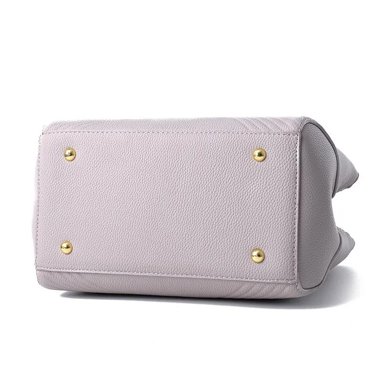 Women Quilted Faux-Leather Handbag with a Heart Shaped Tassel